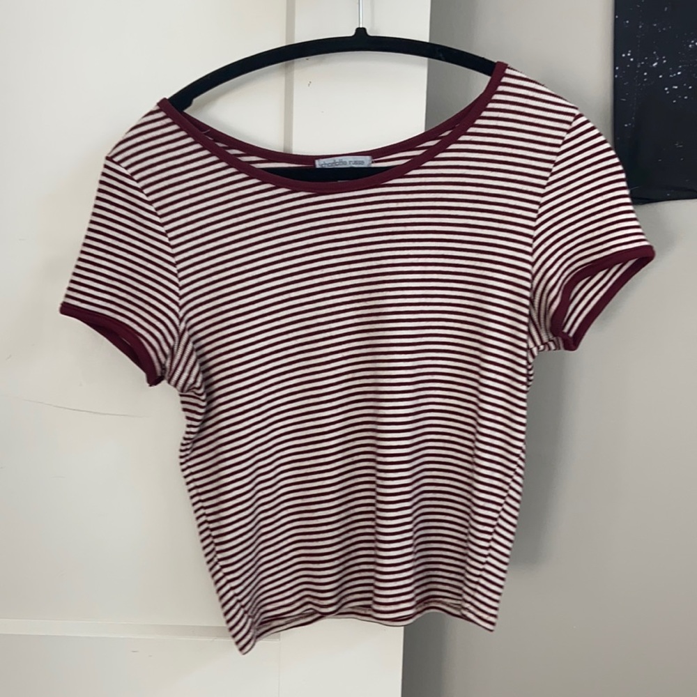 Red and white striped shirt.